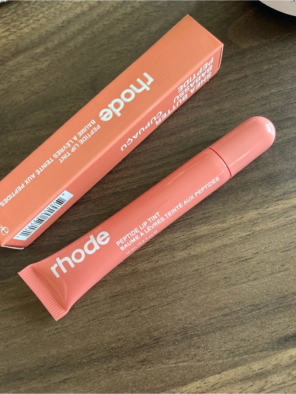 RHODE Peptide Lip Tint in Coral Pink-Orange